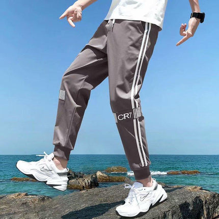 Casual pants men's Korean version of loose casual trend rod strips fashion small feet young people nine pants - Viva Vista Store